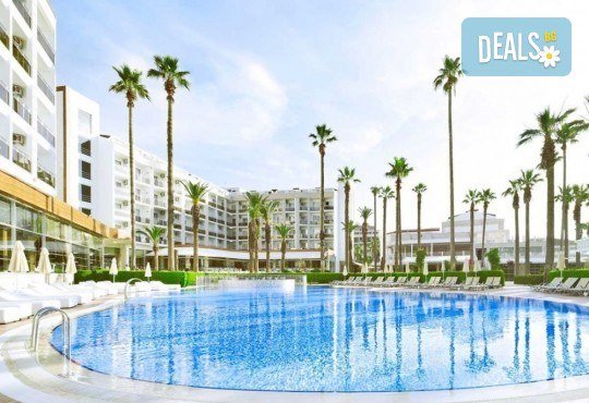През Октомври Ultra All Inclusive на море в IDEAL PRIME BEACH, Мармарис, Турция! 7 нощувки, вечерна шоу програма, жива музика, анимация, безплатно за дете 11.99 г. и транспорт от Belprego Travel! - Снимка 1