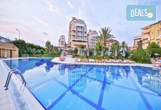 ULTRA ALL INCLUSIVE предложение за края на лятото! 10 дни, 7 нощувки морска ваканция в Hedef Resort & Spa 5*, Алания, Анталия! Включен транспорт, басейни, водна пързалка, безплатно за дете до 12.99 г. от BelpregoTravel - Снимка 1