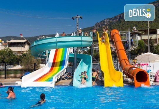 Ранни записвания за лято 2026 г в хотел Ramada Didim By Wyndham Akbuk 4*! 7 нощувки на база ALL Inclusive, басейни, водни пързалки, безплатно за дете до 12.99 г. и транспорт от Belprego Travel - Снимка 2