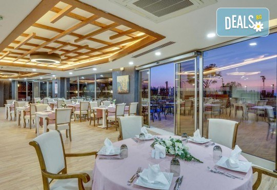 Ранни записвания лято 2026! 7 нощувки на база All Inclusive в хотел RAMADA HOTEL & SUITES BY WYNDHAM 5*, Кушадасъ! басейни, водни пързалки, безплатно за дете до 11.99 г и транспорт от Belprego Travel - Снимка 6