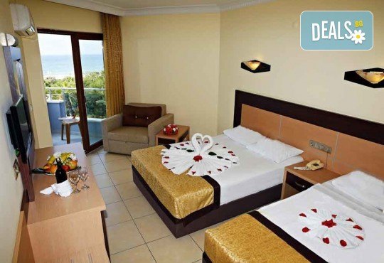 7 нощувки ALL INCLUSIVЕ на море! Ваканция в Caretta Beach Hotel 4*, Алания! Безплатно за дете до 11.99 г, водни пързалки, басейн и транспорт от Belprego Travel - Снимка 6