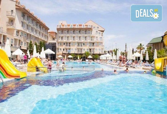 Ultra All Inclusive почивка в Side Aluna EX. Diamond Beach Hotel 5*! 7 нощувки, басейни, водни пързалки, безплатно за дете до 12.99 г. и транспорт от Belprego Travel - Снимка 1