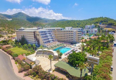 ULTRA ALL INCLUSIVE море 2026 г! Пет звездна ваканция в Beach Club Doganay 5*! 7 нощувки, басейн, водни пързалки, безплатно за дете до 10.99 г. и транспорт от BelpregoTravel - Снимка