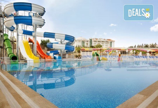 Лято 2026 в Турция! 7 нощувки на база All Inclusive в хотел Ramada Resort By Wyndham Side 4*, басейни, водни пързалки, детски клуб и транспорт от Belprego Travel - Снимка 1