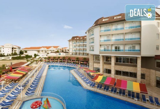 Лято 2026 в Турция! 7 нощувки на база All Inclusive в хотел Ramada Resort By Wyndham Side 4*, басейни, водни пързалки, детски клуб и транспорт от Belprego Travel - Снимка 2