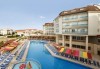 Лято 2026 в Турция! 7 нощувки на база All Inclusive в хотел Ramada Resort By Wyndham Side 4*, басейни, водни пързалки, детски клуб и транспорт от Belprego Travel - thumb 2
