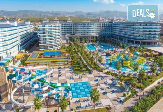 LAST MINUTE: All Inclusive ваканция 2026 в Batihan Beach Resort 5*, Кушадасъ! 7 нощувки, басейни, водни пързалки, безплатно за дете до 12.99 г. и транспорт от Belprego Travel - Снимка 1