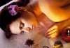 Релаксирайте с 50 минутен релаксиращ или болкоуспокояващ масаж на гръб с масла на Glory от салон за красота Sassy! - thumb 1