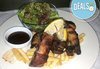 Половин килограм апетитни свински ребърца с барбекю сос, пържени картофки и зелени салати от Бистро Villy's - thumb 1