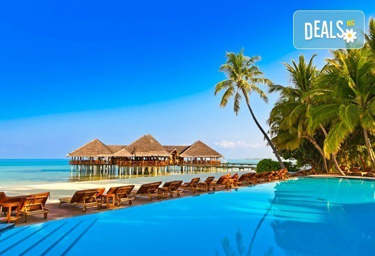 Посрещнете Нова година на Малдивите! 9 нощувки на база пълен пансион и празнична вечеря в Ranveli Village 4*, самолетен билет! - Снимка 1