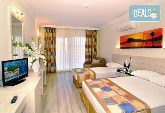 Великден в Анталия на супер цена! 5 нощувки на база All Inclusive в Gardenia Beach 4*, двупосочен билет за директен чартърен полет, летищни такси и трансфери - Снимка 2