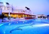 Мини почивка в Уранополи, Халкидики през май! 3 нощувки със закуски и вечери в хотел Akti Ouranoupoli Beach Resort 4* и транспорт - thumb 1