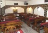 Сач Касапска гощавка със свинско и пилешко месо, сос барбекю, гъби + ДВЕ наливни бири и домашна пърленка в Ресторант - механа Мамбо! - thumb 3