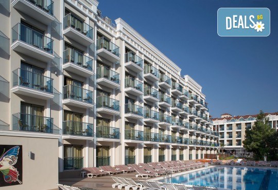 Незабравима почивка в края на лятото в Hotel Emre 4* в Мармарис, Турция! 9 нощувки на база Ultra All Inclusive, транспорт и водач от Дари Тур! - Снимка 1