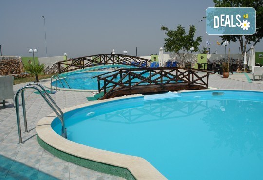 Нова година в Драма, Гърция! 2 нощувки със закуски, празнична вечеря с програма в Achilio Hotel 4*, транспорт и посещение на Лидия, Филипи, Кавала и Керкини! - Снимка 10