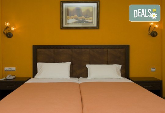 Нова година в Драма, Гърция! 2 нощувки със закуски, празнична вечеря с програма в Achilio Hotel 4*, транспорт и посещение на Лидия, Филипи, Кавала и Керкини! - Снимка 8