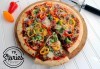 Хапнете вкусна пица по Ваш избор в уютната обстановка на ресторант-барбекю 79 Stories! - thumb 1