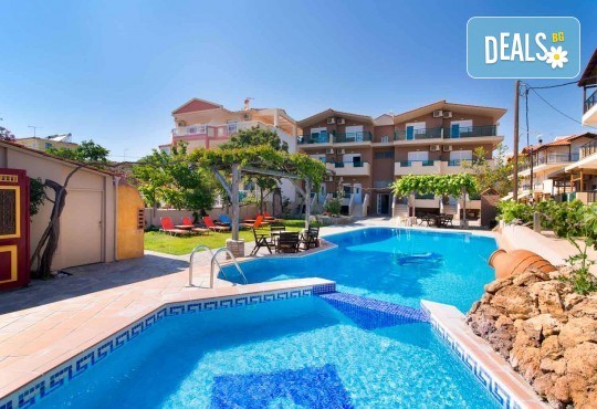 Специални цени за почивка на о. Тасос за юни или период по избор с ТА Солвекс! 7 нощувки със закуски и вечери в Christos Studios 2*, Лименария, транспорт - Снимка 1