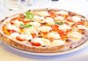 Апетитно и изгодно предложение! Вземете вкусна пица по Ваш избор oт Hubi-Brothers в Княжево! - thumb 1