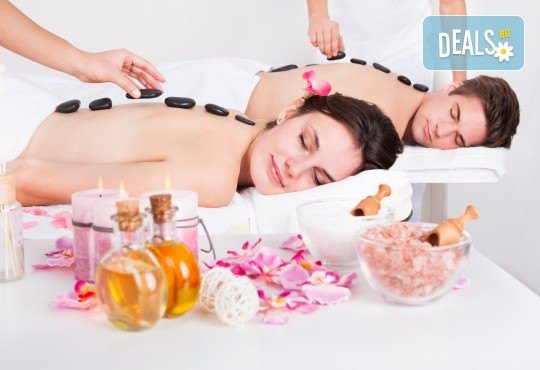 Вулканично сияние за двама! Дълбокорелаксиращ масаж за двама на цяло тяло със суфле от вулканични камъни в СПА център Senses Massage & Recreation - Снимка 1